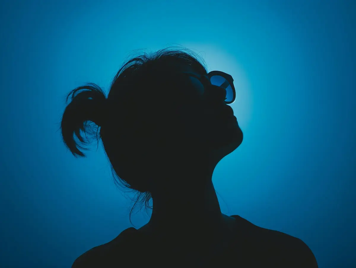 silhouette model in blue light